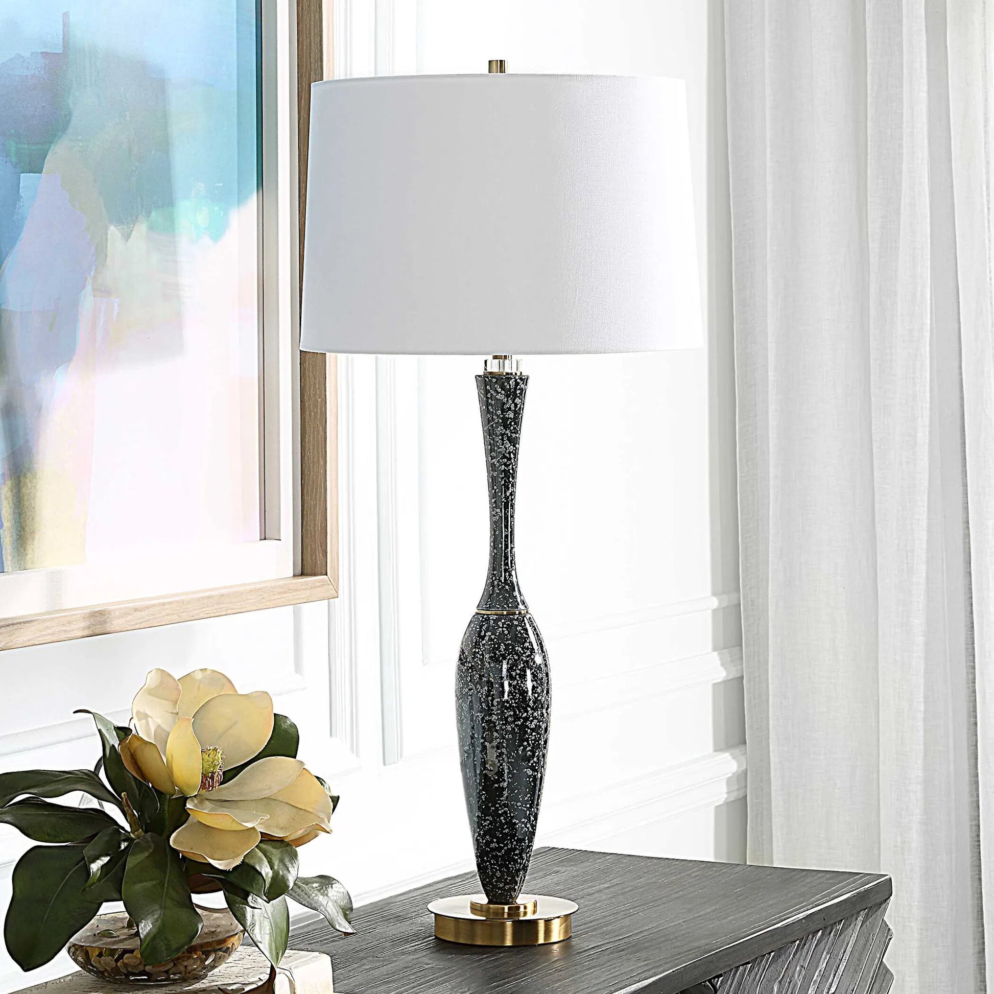 Remy Table Lamp by Uttermost in dark navy. Made from ceramic, iron, fabric, acrylic in a eclectic & global style.