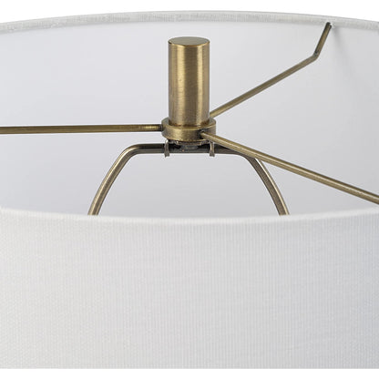 Remy Table Lamp by Uttermost in dark navy. Made from ceramic, iron, fabric, acrylic in a eclectic & global style.