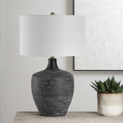 Graphite Ribbed Table Lamp by Uttermost in brass. Made from ceramic, fabric, metal in a unique style.