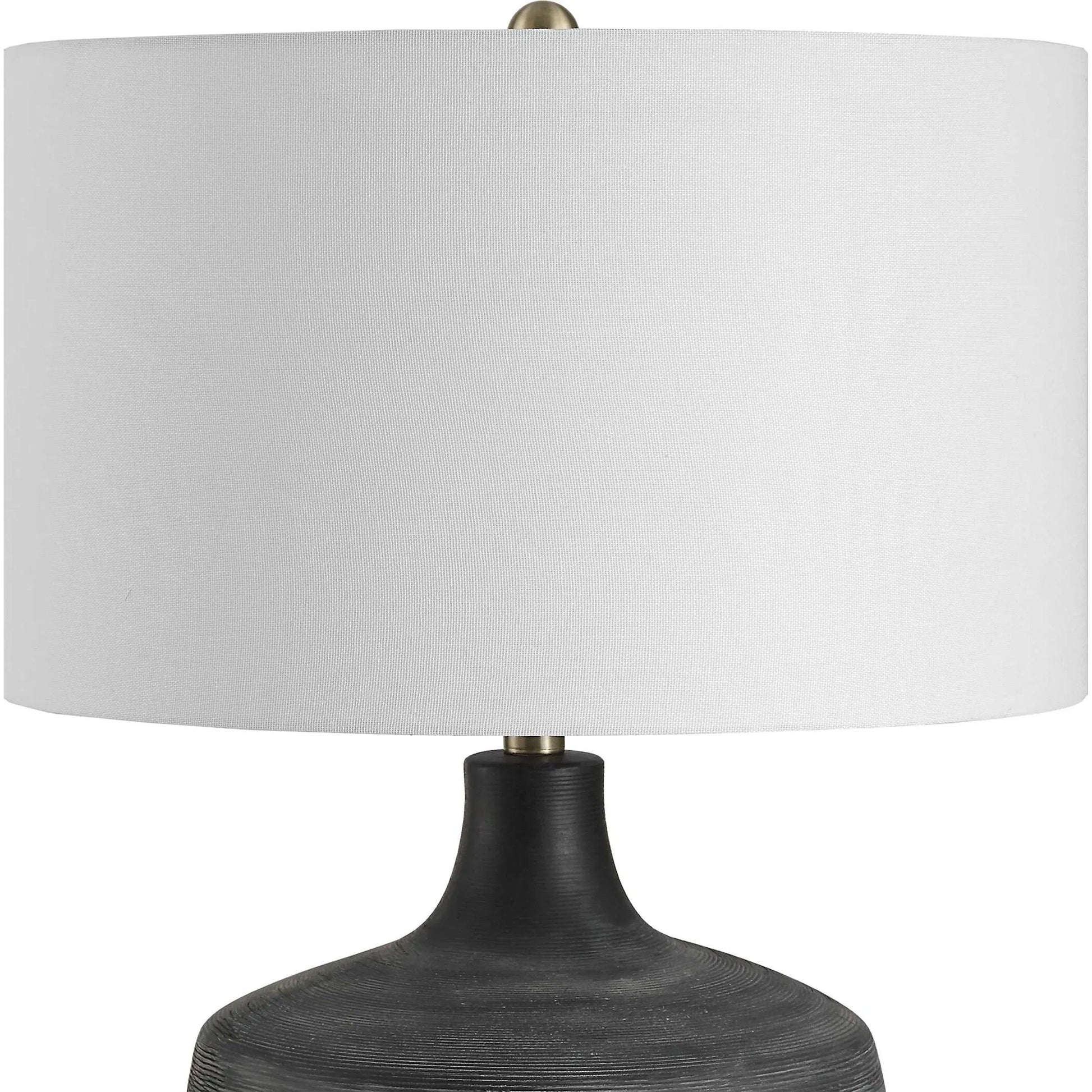 Graphite Ribbed Table Lamp by Uttermost in brass. Made from ceramic, fabric, metal in a unique style.