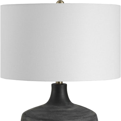 Graphite Ribbed Table Lamp by Uttermost in brass. Made from ceramic, fabric, metal in a unique style.