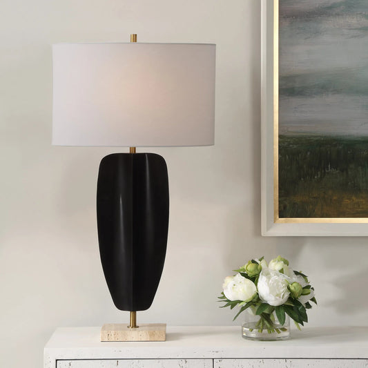 Kure Table Lamp by Uttermost in brass. Made from iron, travertine, fabric in a modern style.