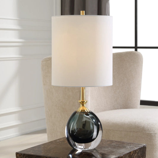Enigma Glass Buffet Lamp by Uttermost in brass. Made from colored glaze glass, metal, fabric in a unique style.