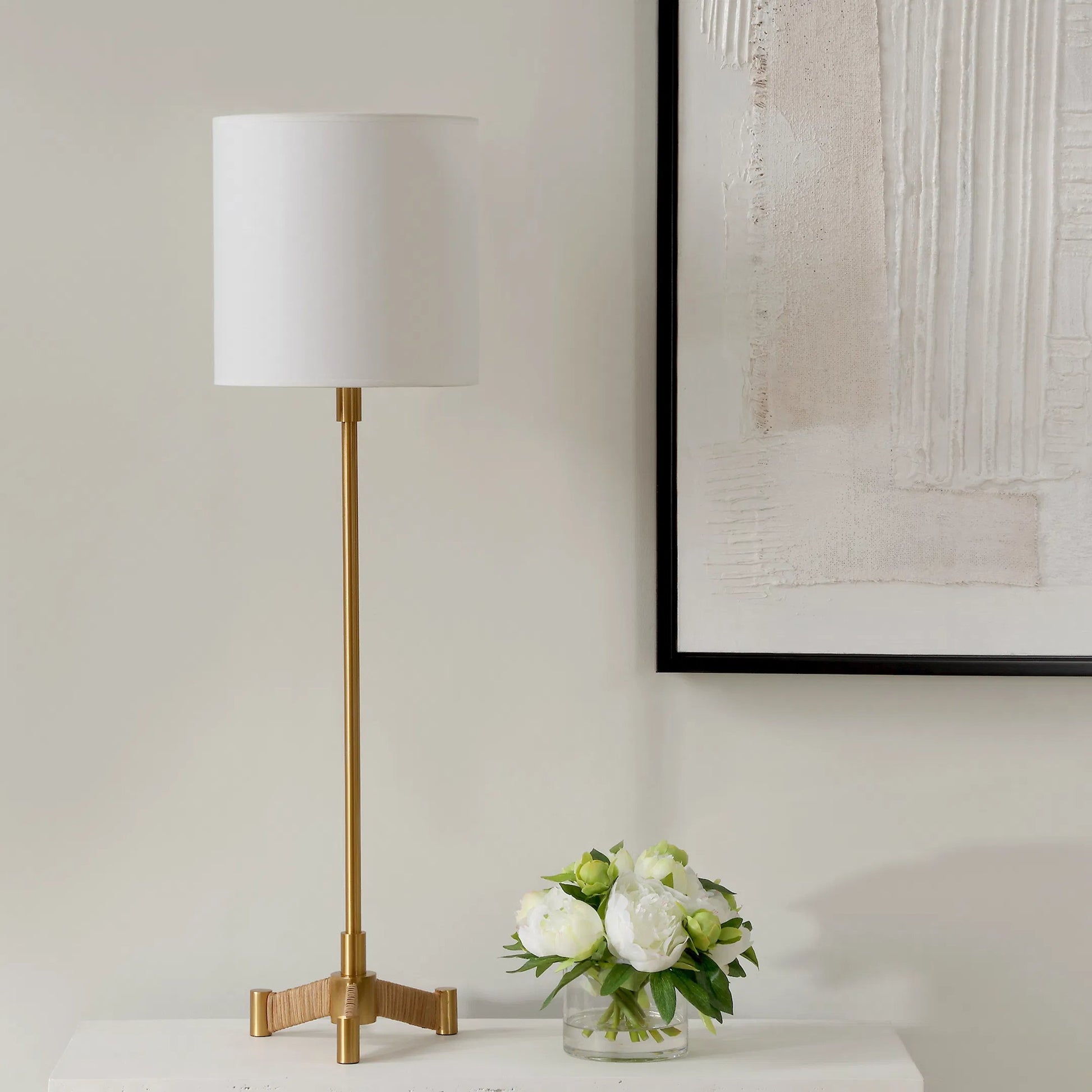 Lautoka Buffet Lamp by Uttermost in brass. Made from steel, rattan, fabric in a transitional style.
