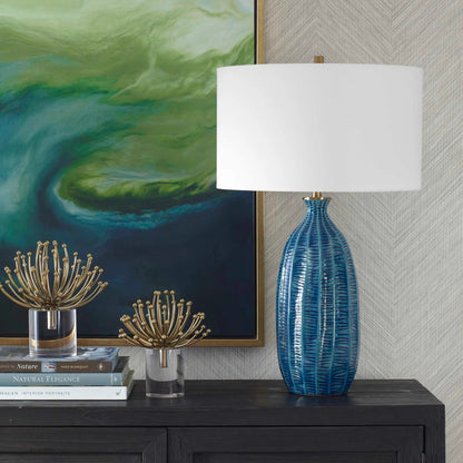 Bixby Table Lamp by Uttermost in brass. Made from ceramic, fabric, metal in a eclectic & global style.