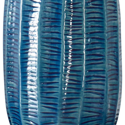 Bixby Table Lamp by Uttermost in brass. Made from ceramic, fabric, metal in a eclectic & global style.