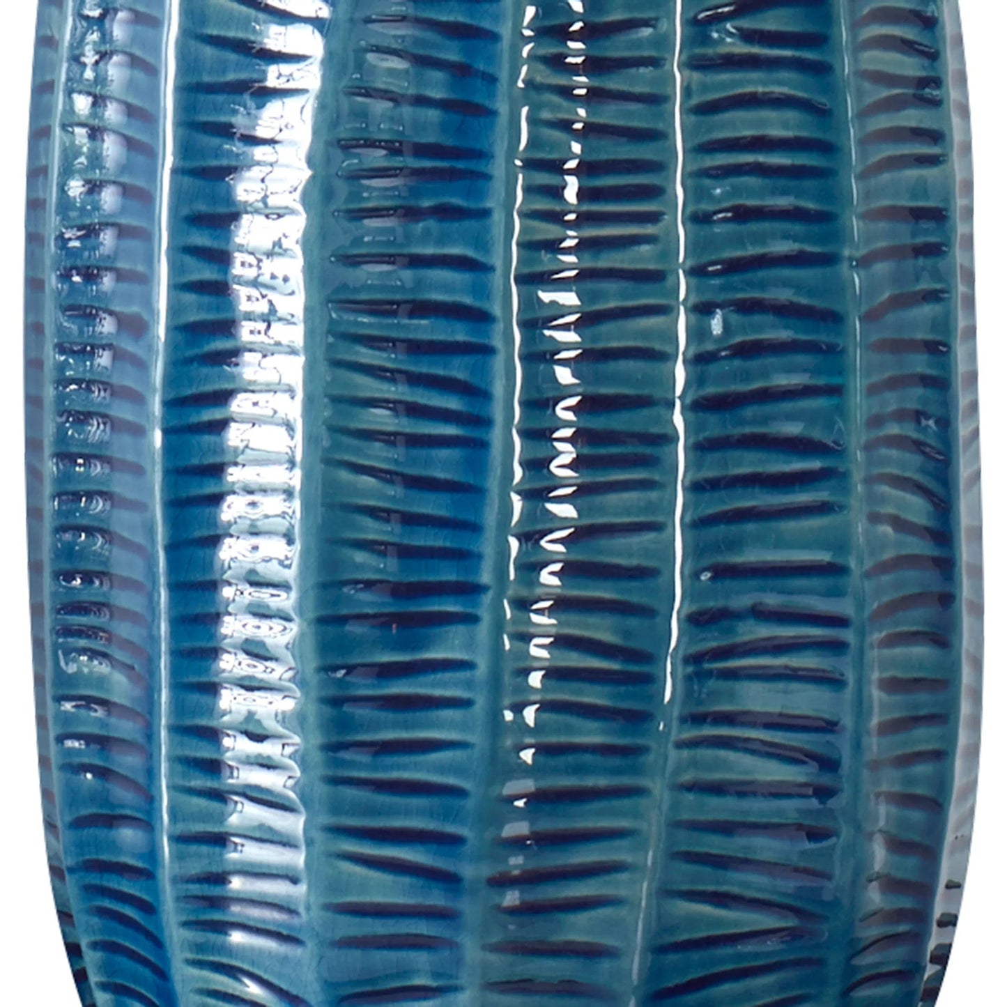 004 SI-2262413 | Closeup | Bixby Table Lamp by Uttermost in brass. Made from ceramic, fabric, metal in a eclectic & global style.