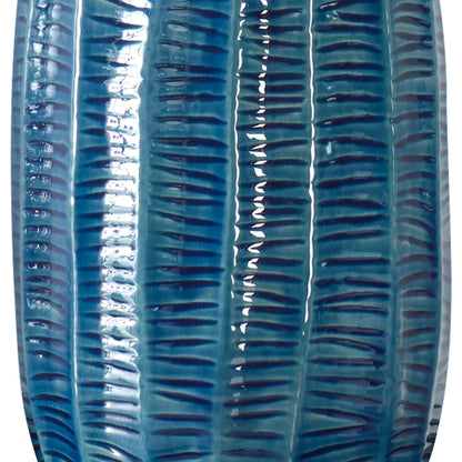 Bixby Table Lamp by Uttermost in brass. Made from ceramic, fabric, metal in a eclectic & global style.