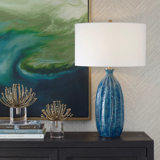 Bixby Table Lamp by Uttermost in brass. Made from ceramic, fabric, metal in a unique style.