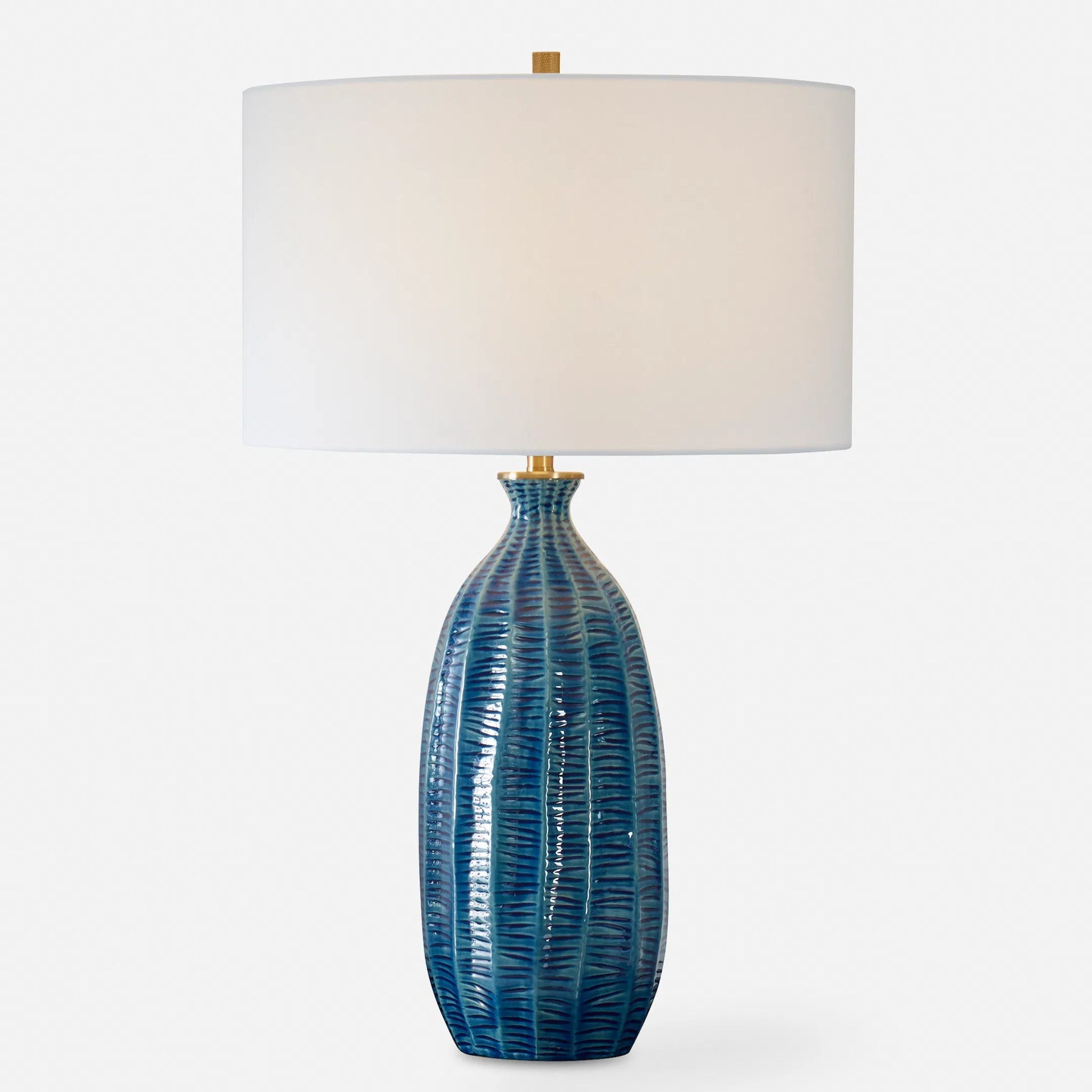 Bixby Table Lamp by Uttermost in brass. Made from ceramic, fabric, metal in a eclectic & global style.