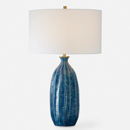Bixby Table Lamp by Uttermost in brass. Made from ceramic, fabric, metal in a eclectic & global style.