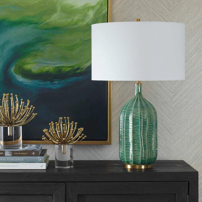 Bixby Table Lamp by Uttermost in brass. Made from ceramic, fabric, metal in a eclectic & global style.