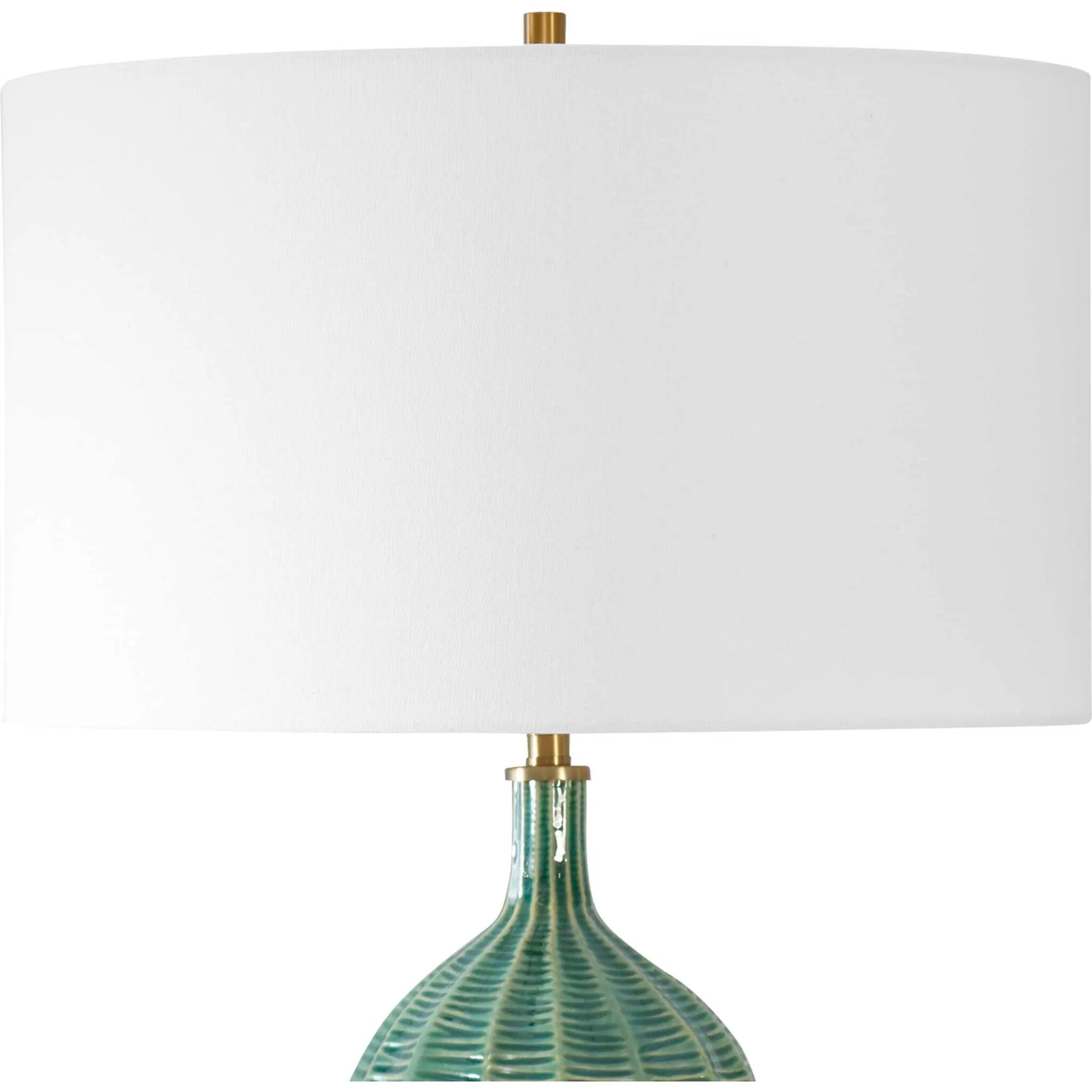 Bixby Table Lamp by Uttermost in brass. Made from ceramic, fabric, metal in a eclectic & global style.