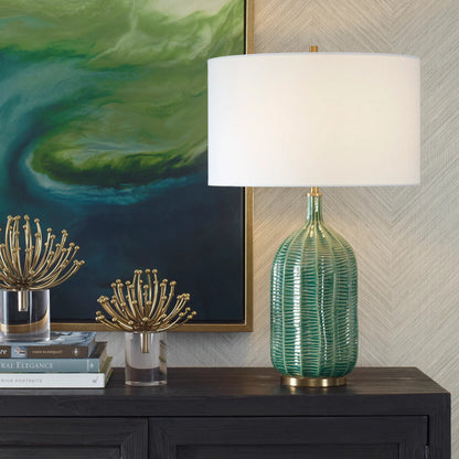 Bixby Table Lamp by Uttermost in brass. Made from ceramic, fabric, metal in a eclectic & global style.