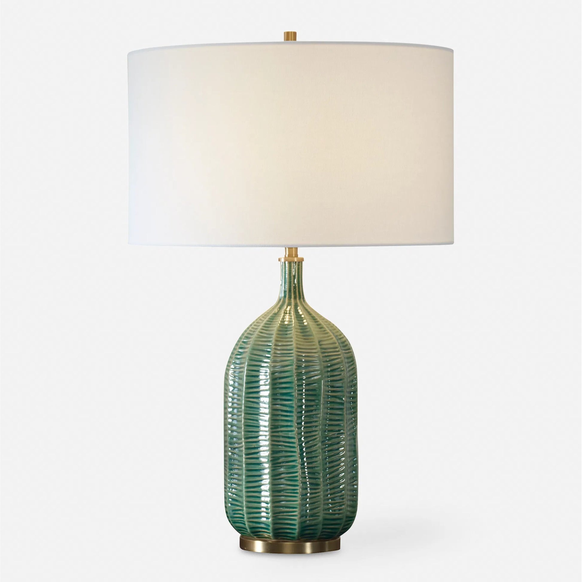 Bixby Table Lamp by Uttermost in brass. Made from ceramic, fabric, metal in a eclectic & global style.
