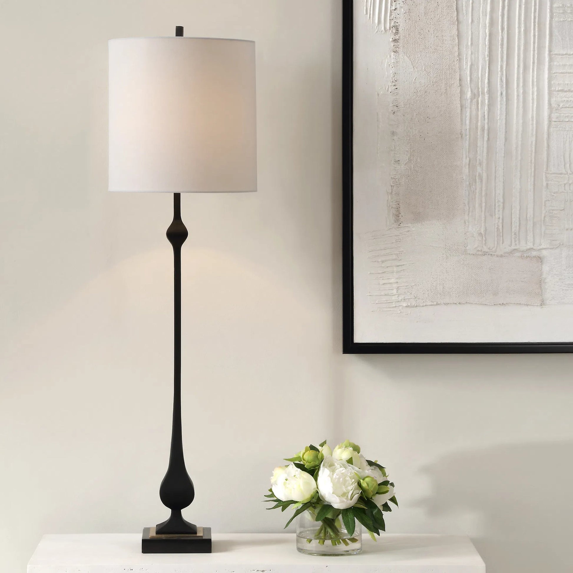 Hightower Buffet Lamp by Uttermost in brass. Made from marble, iron, resin, fabric in a modern style.