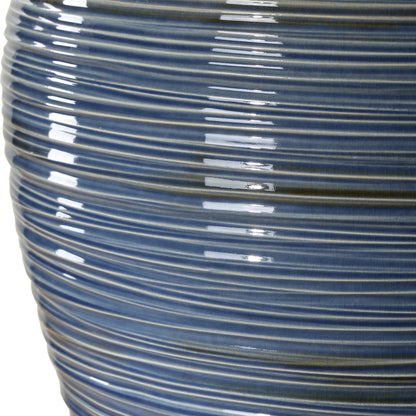 Moher Glossy Table Lamp by Uttermost in brass. Made from ceramic, crystal, iron, fabric in a eclectic & global style.