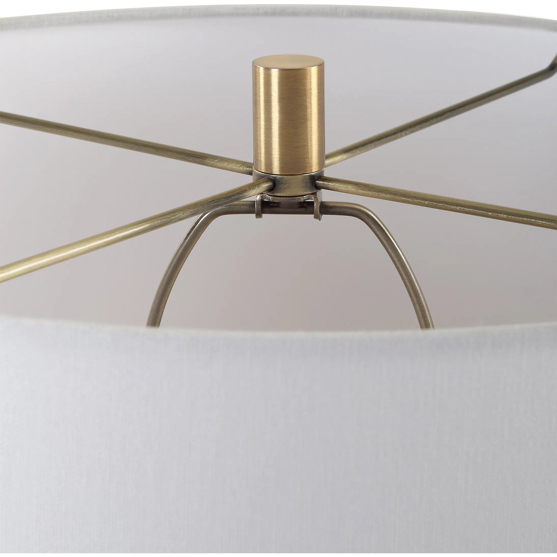Nocturnal Table Lamp by Uttermost in brass. Made from mad-made stone, iron, fabric in a modern style.