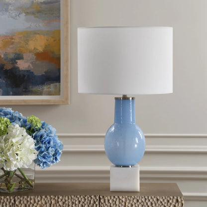 Clear Sky Glass Table Lamp by Uttermost in nickel. Made from iron, glass, marble, linen in a eclectic & global style.
