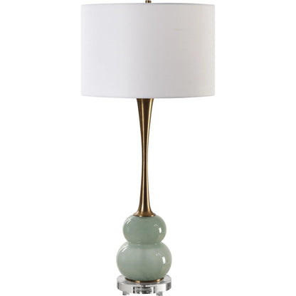 Sanctuary Table Lamp by Uttermost in brass. Made from iron, crystal, fabric, glass in a modern style.