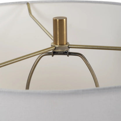 Sanctuary Table Lamp by Uttermost in brass. Made from iron, crystal, fabric, glass in a modern style.