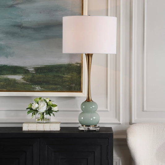 Sanctuary Table Lamp by Uttermost in brass. Made from iron, crystal, fabric, glass in a unique style.