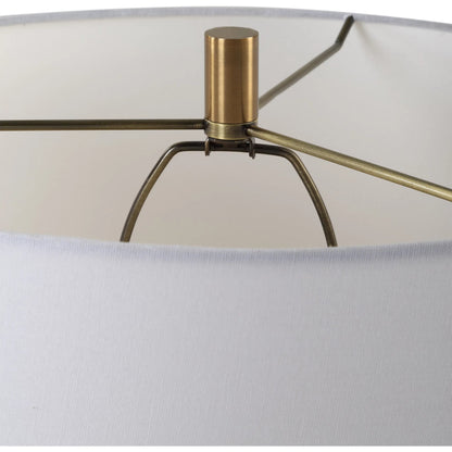 Wisp Table Lamp by Uttermost in brass. Made from ceramic, crystal, steel, fabric in a modern style.