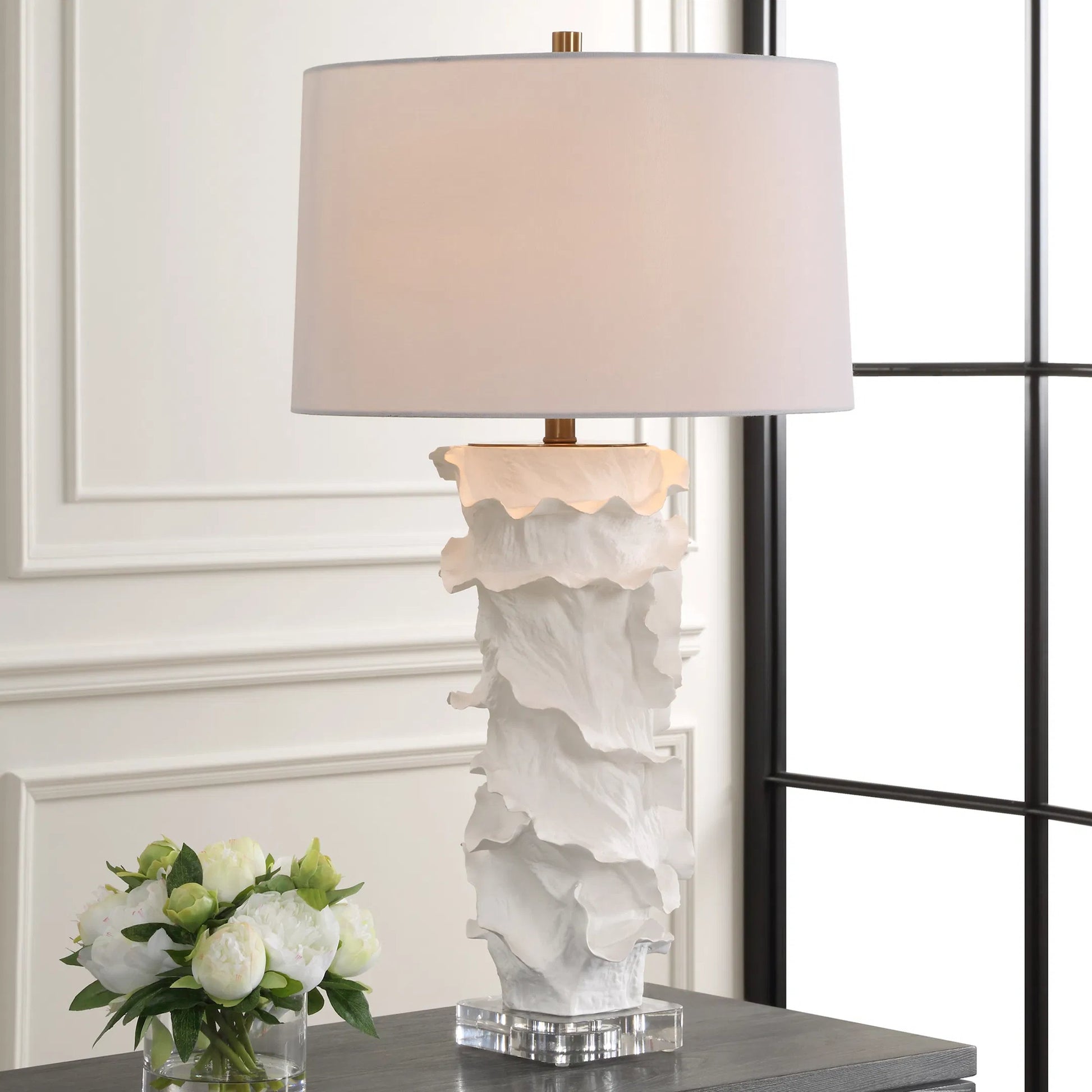 Wisp Table Lamp by Uttermost in brass. Made from ceramic, crystal, steel, fabric in a modern style.