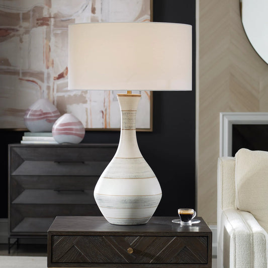Potter Striped Table Lamp by Uttermost in blue. Made from ceramic, fabric, metal in a unique style.