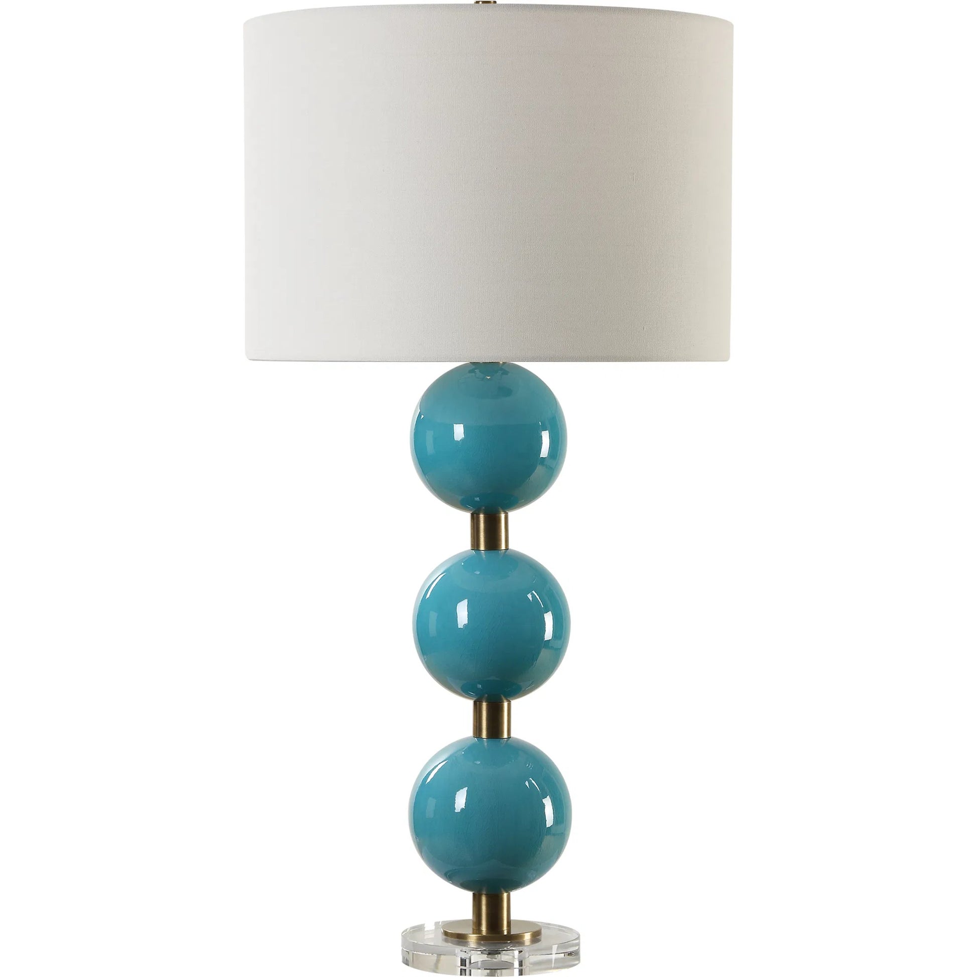 Palawan Glaze Table Lamp by Uttermost in brass. Made from iron, ceramic, crystal, fabirc in a eclectic & global style.