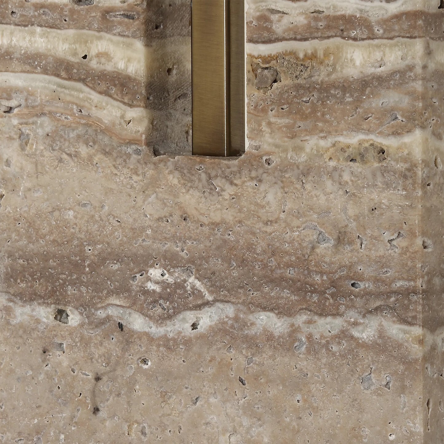 006 SI-2262435 | Closeup | Turning Point Travertine Table Lamp by Uttermost in brass. Made from iron, travertine, fabric in a transitional style.