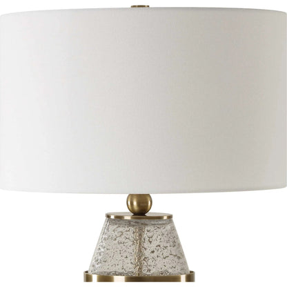 Out of Time Seeded Glass Table Lamp by Uttermost in brass. Made from iron, glass, fabric in a modern style.