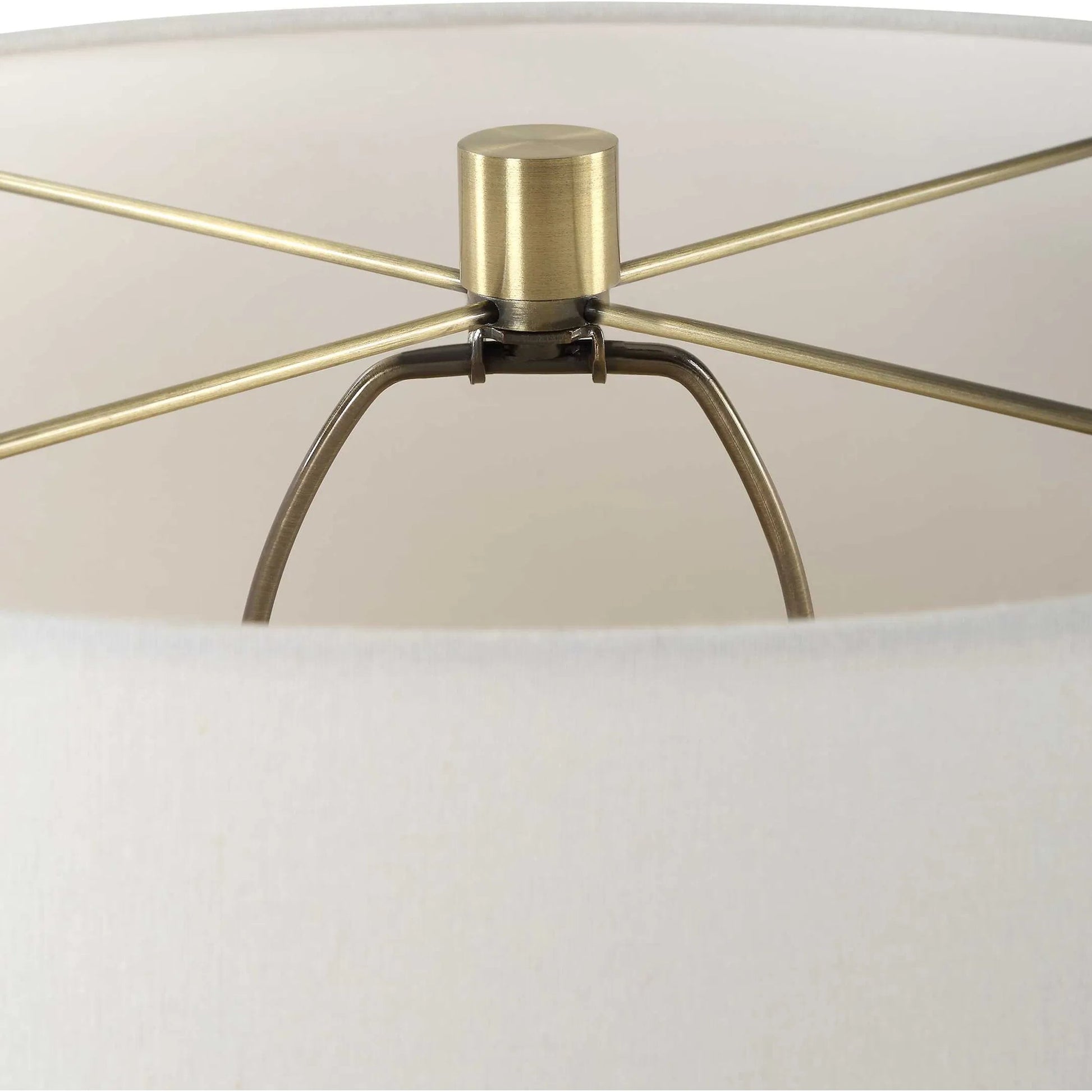 Out of Time Seeded Glass Table Lamp by Uttermost in brass. Made from iron, glass, fabric in a modern style.
