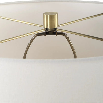 Out of Time Seeded Glass Table Lamp by Uttermost in brass. Made from iron, glass, fabric in a modern style.