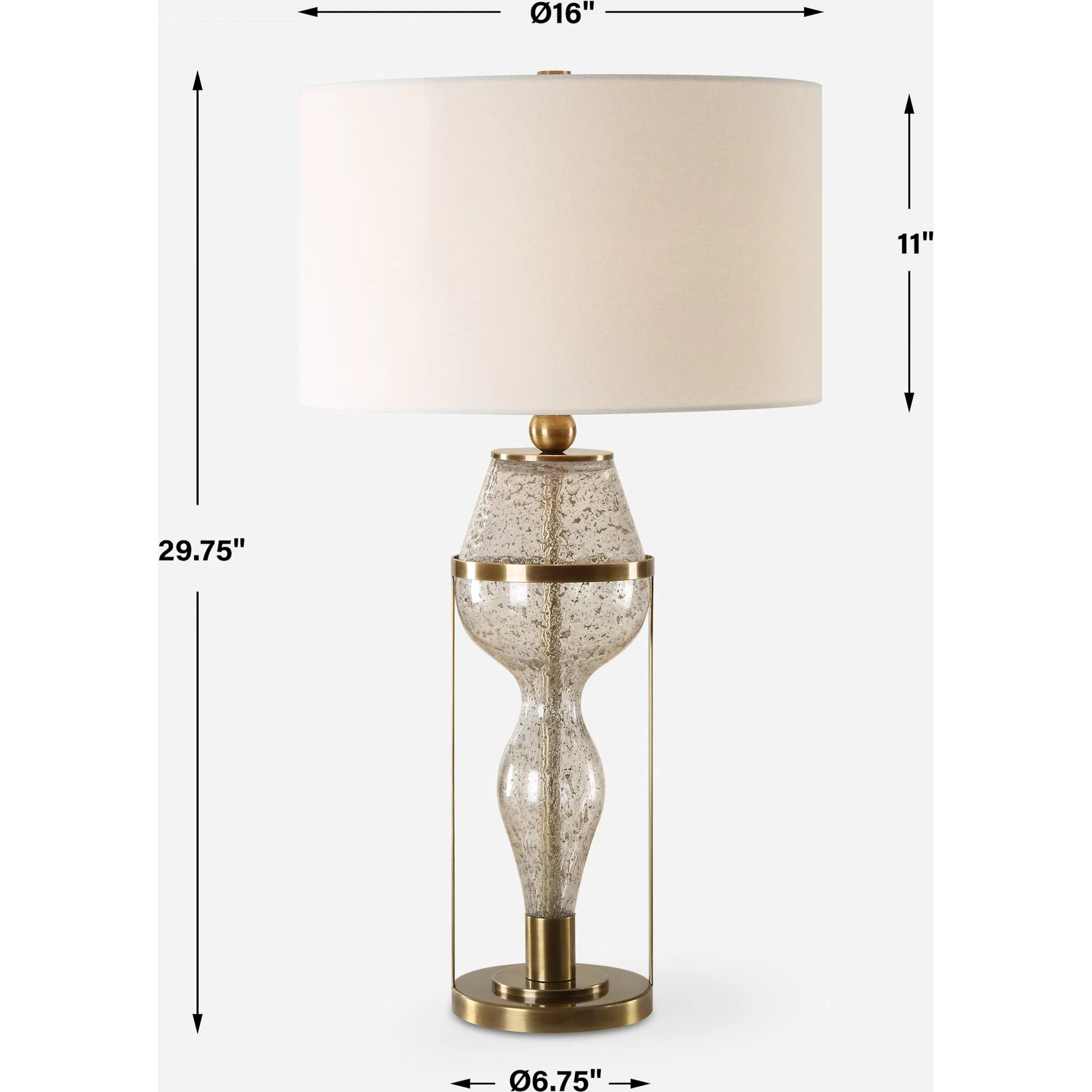 Out of Time Seeded Glass Table Lamp by Uttermost in brass. Made from iron, glass, fabric in a modern style.