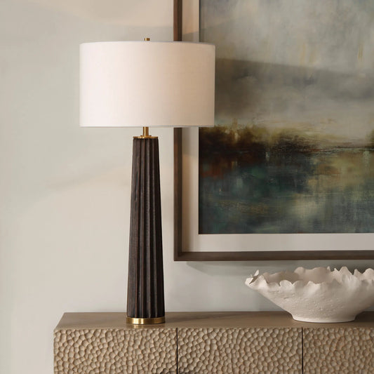 Forage Scalloped Table Lamp by Uttermost in dark. Made from metal, oak wood, fabric in a unique style.