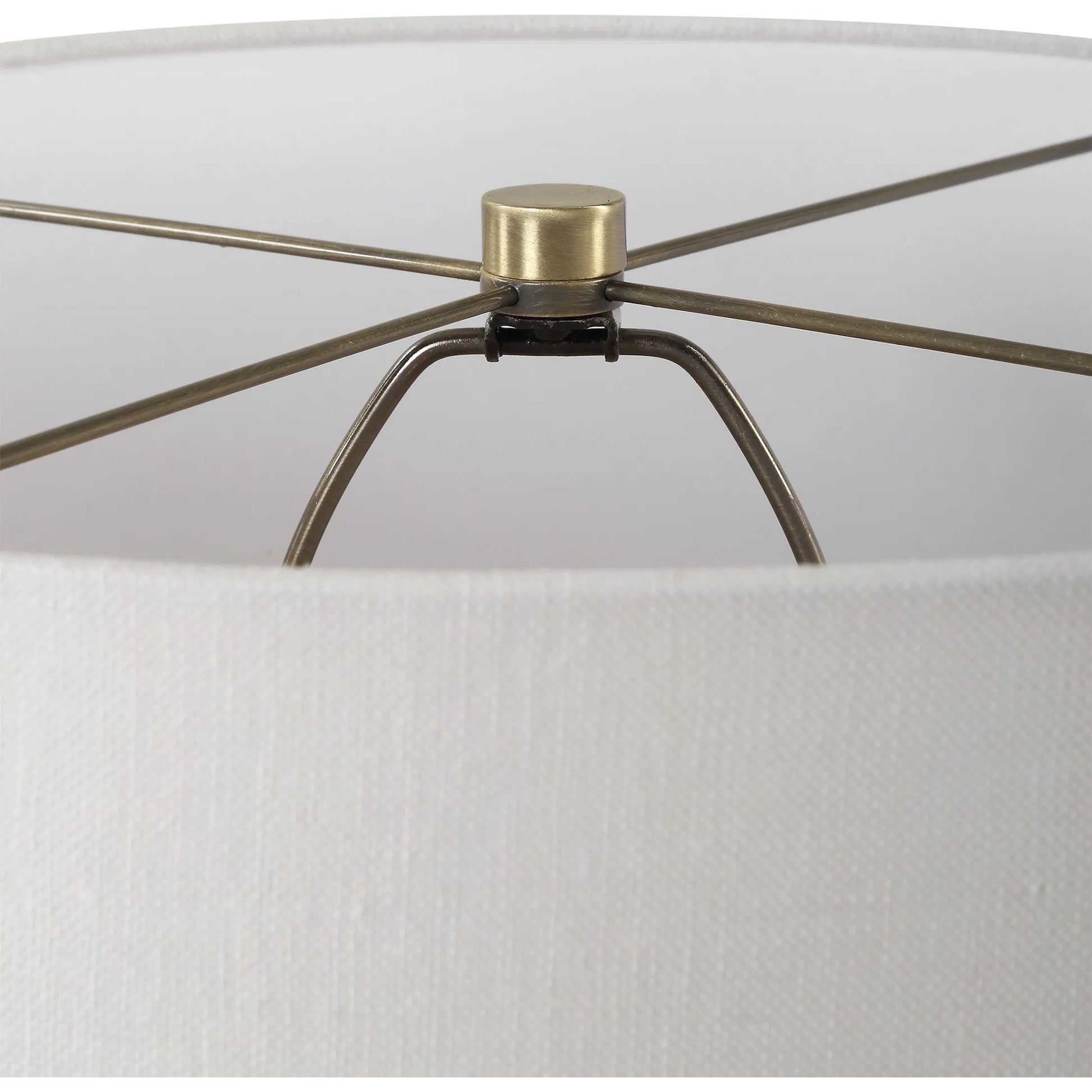 Crimp Ribbed Table Lamp by Uttermost in gold leaf. Made from steel, ceramic, fabric in a transitional style.