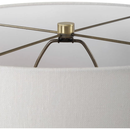 Crimp Ribbed Table Lamp by Uttermost in gold leaf. Made from steel, ceramic, fabric in a transitional style.