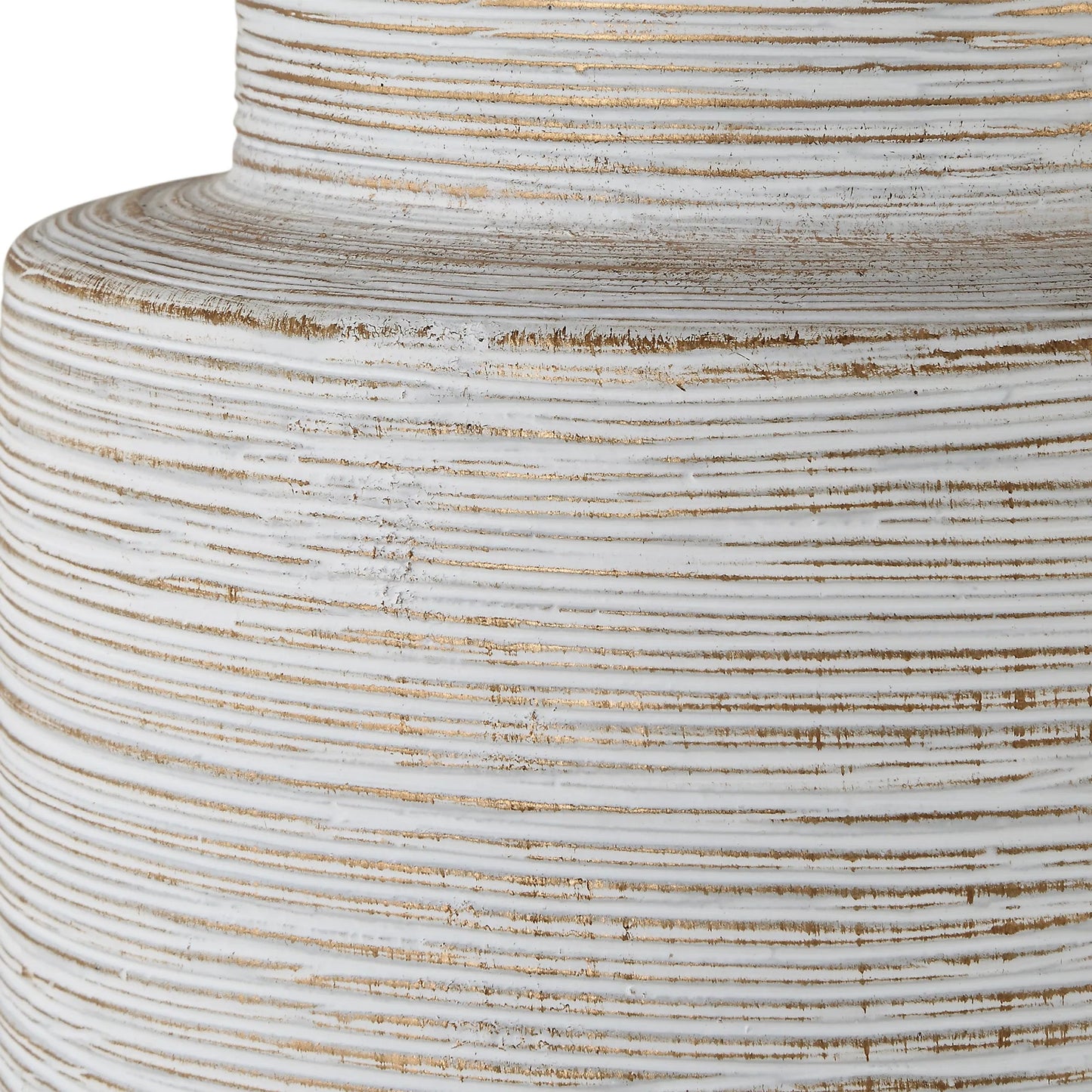 006 SI-2262452 | Closeup | Crimp Ribbed Table Lamp by Uttermost in gold leaf. Made from steel, ceramic, fabric in a transitional style.