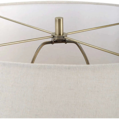 Pueblo Fired Clay Table Lamp by Uttermost in brass. Made from ceramic, metal, fabric in a transitional style.
