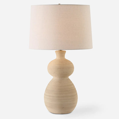 Pueblo Fired Clay Table Lamp by Uttermost in brass. Made from ceramic, metal, fabric in a transitional style.