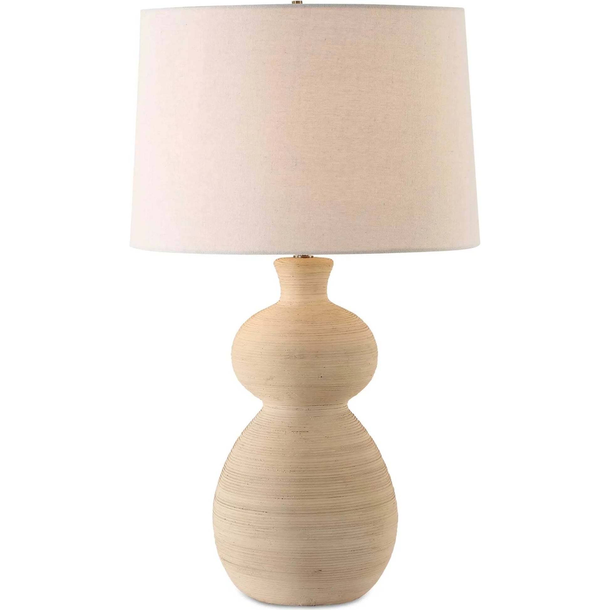 Pueblo Fired Clay Table Lamp by Uttermost in brass. Made from ceramic, metal, fabric in a transitional style.