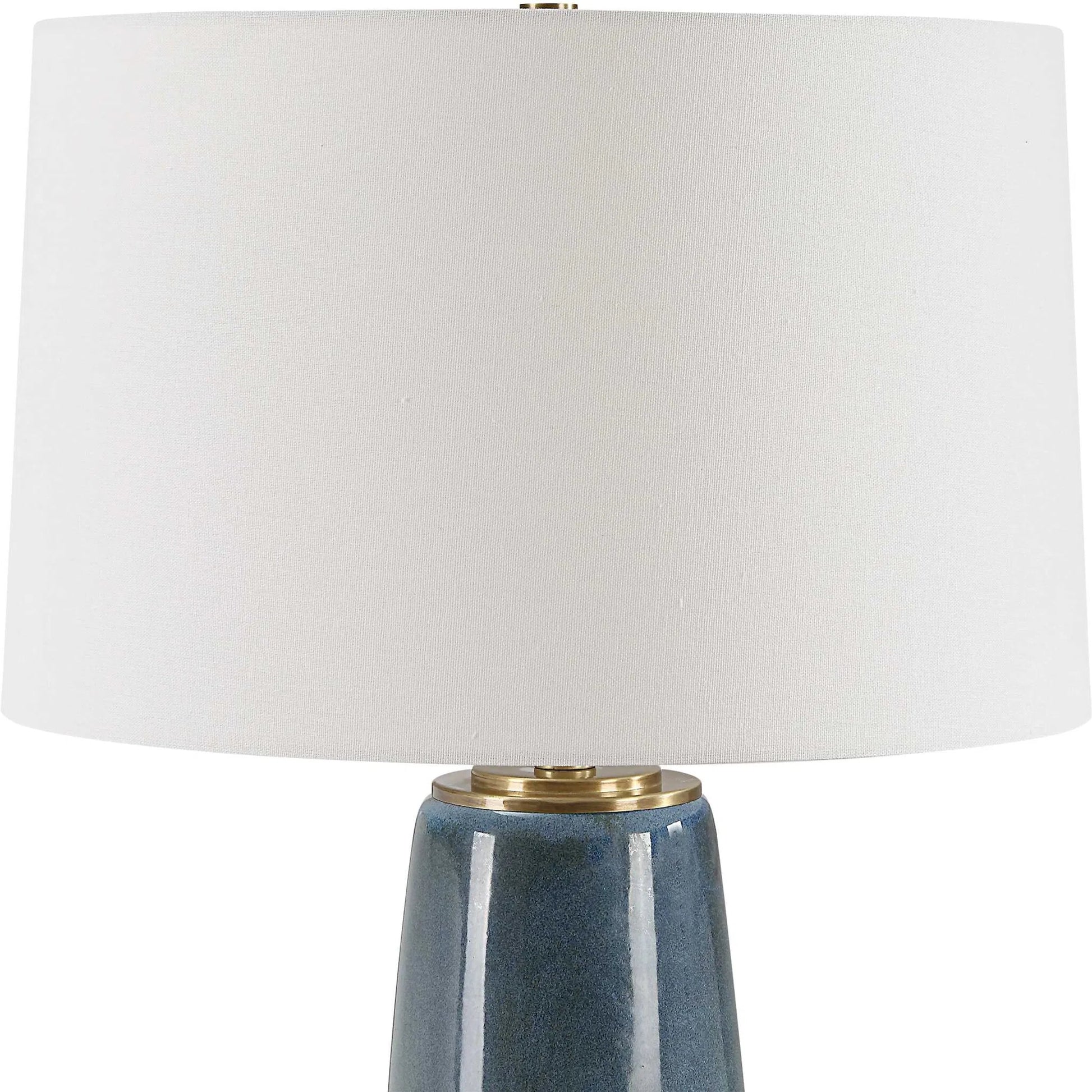 Submerged Table Lamp by Uttermost in brass. Made from iron, ceramic, fabric in a eclectic & global style.