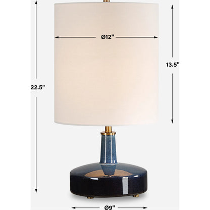 Abyss Table Lamp by Uttermost in brass. Made from iron, ceramic, fabric in a modern style.