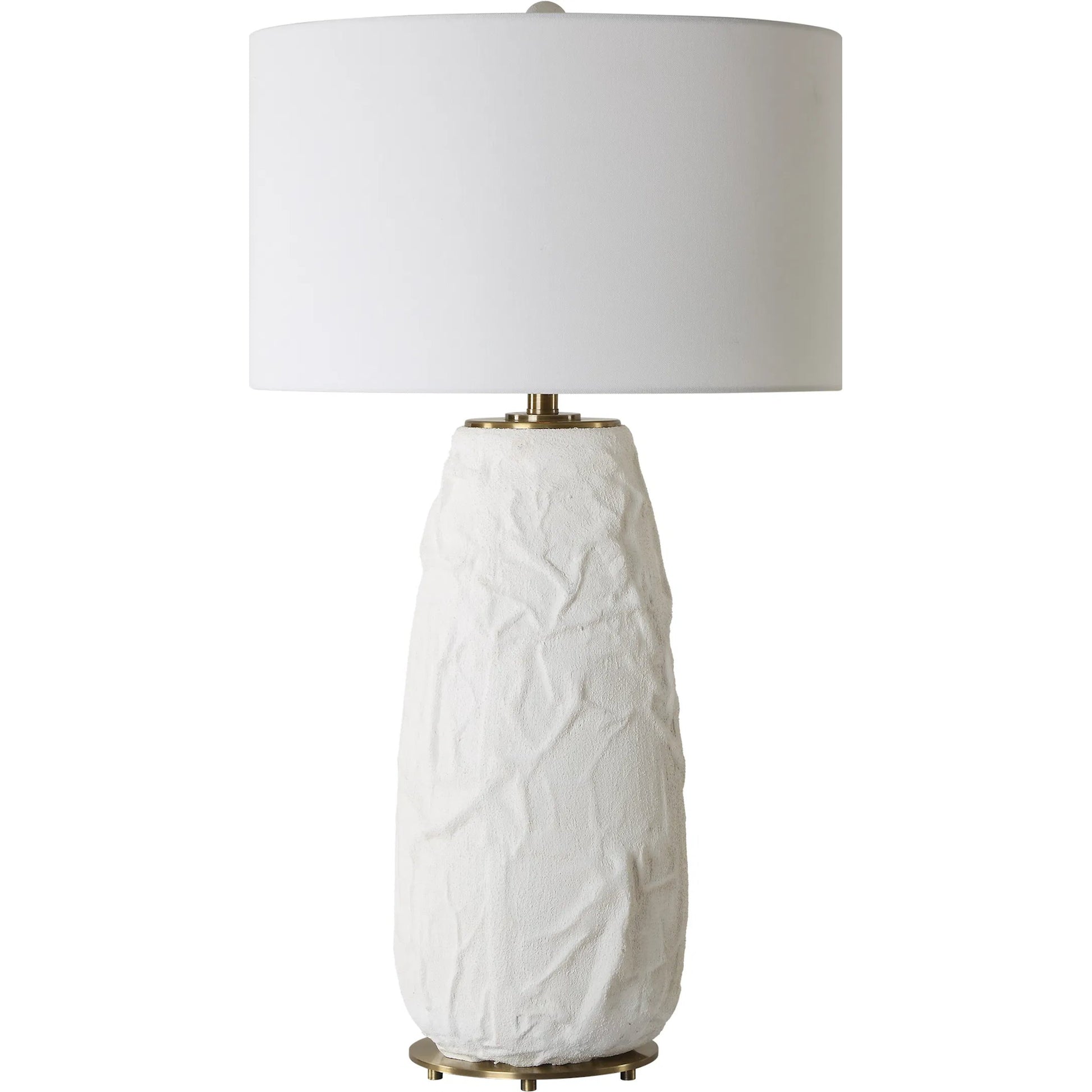 Vida Table Lamp by Uttermost in brass. Made from steel, ceramic, fabric in a modern style.