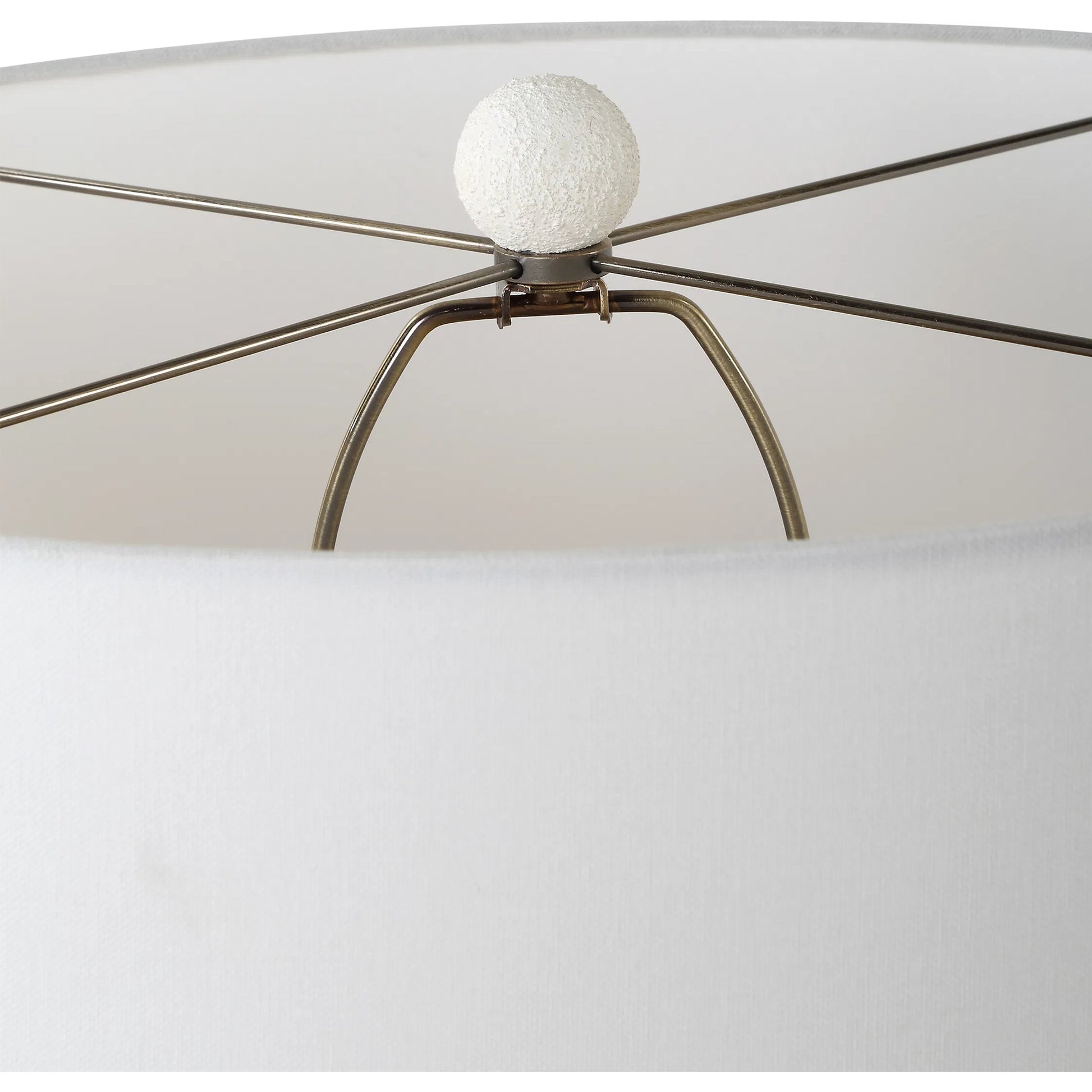 Vida Table Lamp by Uttermost in brass. Made from steel, ceramic, fabric in a modern style.