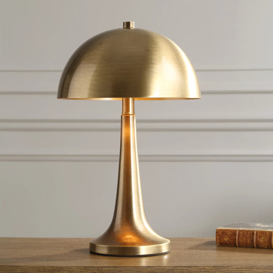 Dame Table Lamp by Uttermost in brass. Made from iron in a modern style.
