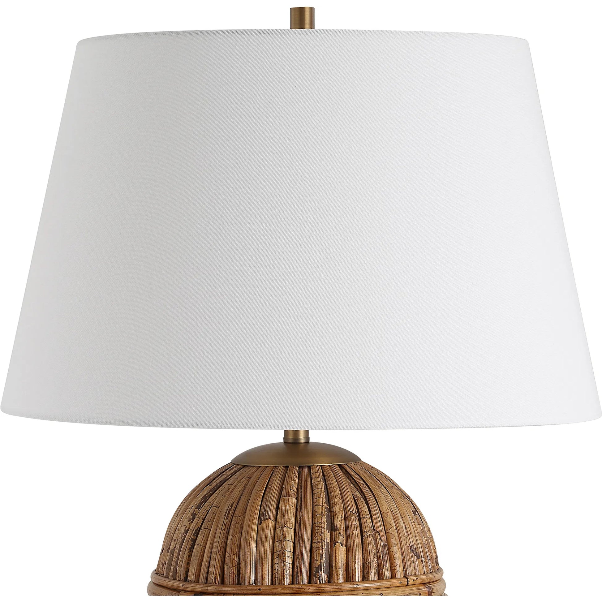 Reed Honey Rattan Table Lamp by Uttermost in brass. Made from steel, rattan, fabric in a rustic style.