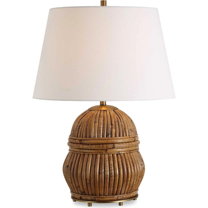 Reed Honey Rattan Table Lamp by Uttermost in brass. Made from steel, rattan, fabric in a rustic style.