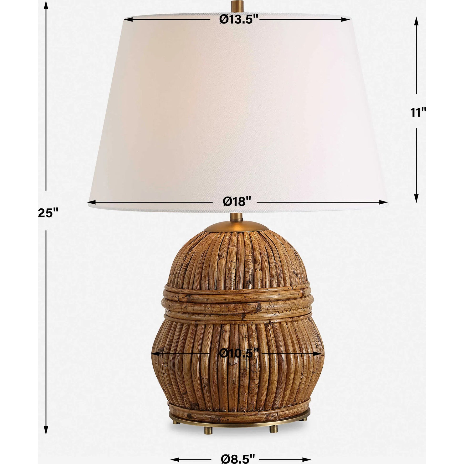 Reed Honey Rattan Table Lamp by Uttermost in brass. Made from steel, rattan, fabric in a rustic style.